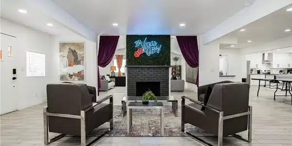Image 4: A vibrant living space with a distinct fireplace f