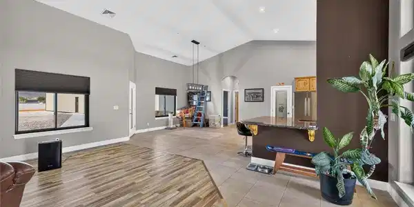 Image 4: A spacious great room offers an inviting atmospher