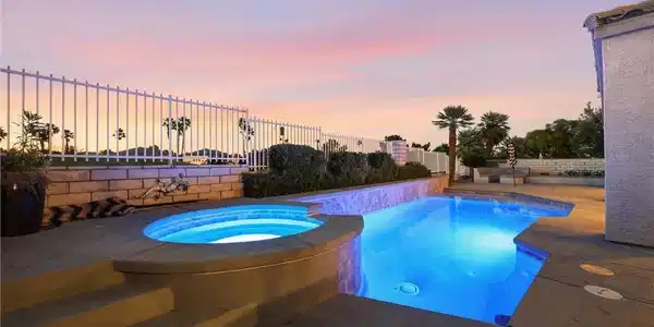 Image 3: Twilight glow illuminates this private backyard oa