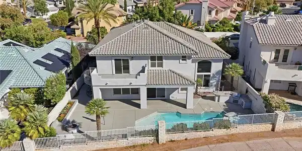 Image 4: An aerial perspective reveals a private swimming p