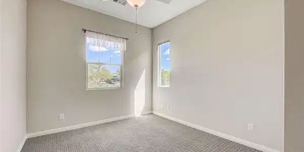 Image 3: Well-lit room with ample natural illumination feat