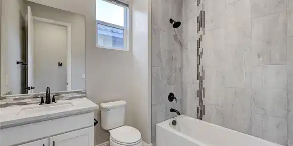 Image 4: A well-appointed bathroom with contemporary fixtur