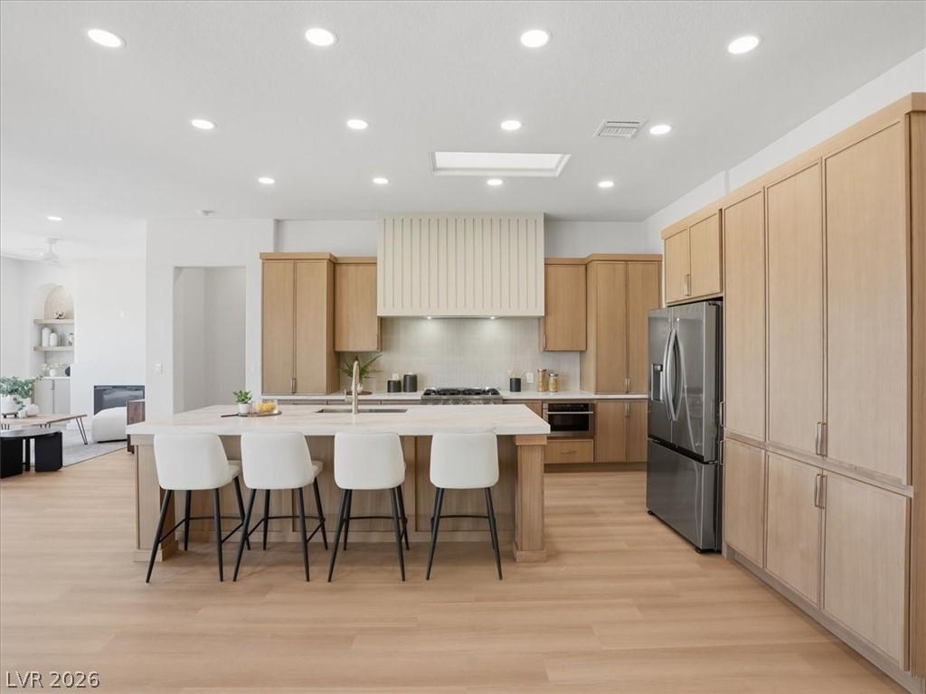 Image 2: Culinary delights await in this bright kitchen wit