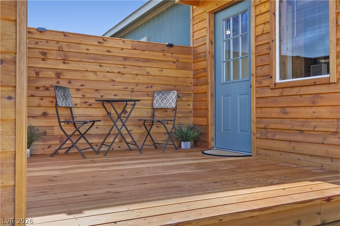 Image 4: The exterior showcases custom cedar & redwood acce