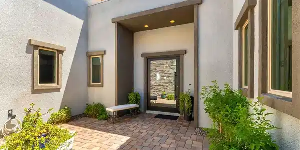 Image 4: An inviting entry to this contemporary home, featu