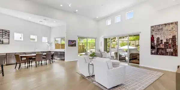 Image 4: Stylish and inviting, this expansive great room fl
