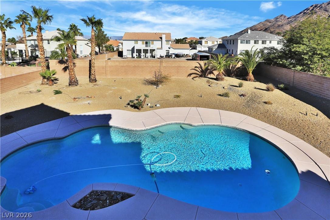 Image 4: View of the Pool from Patio