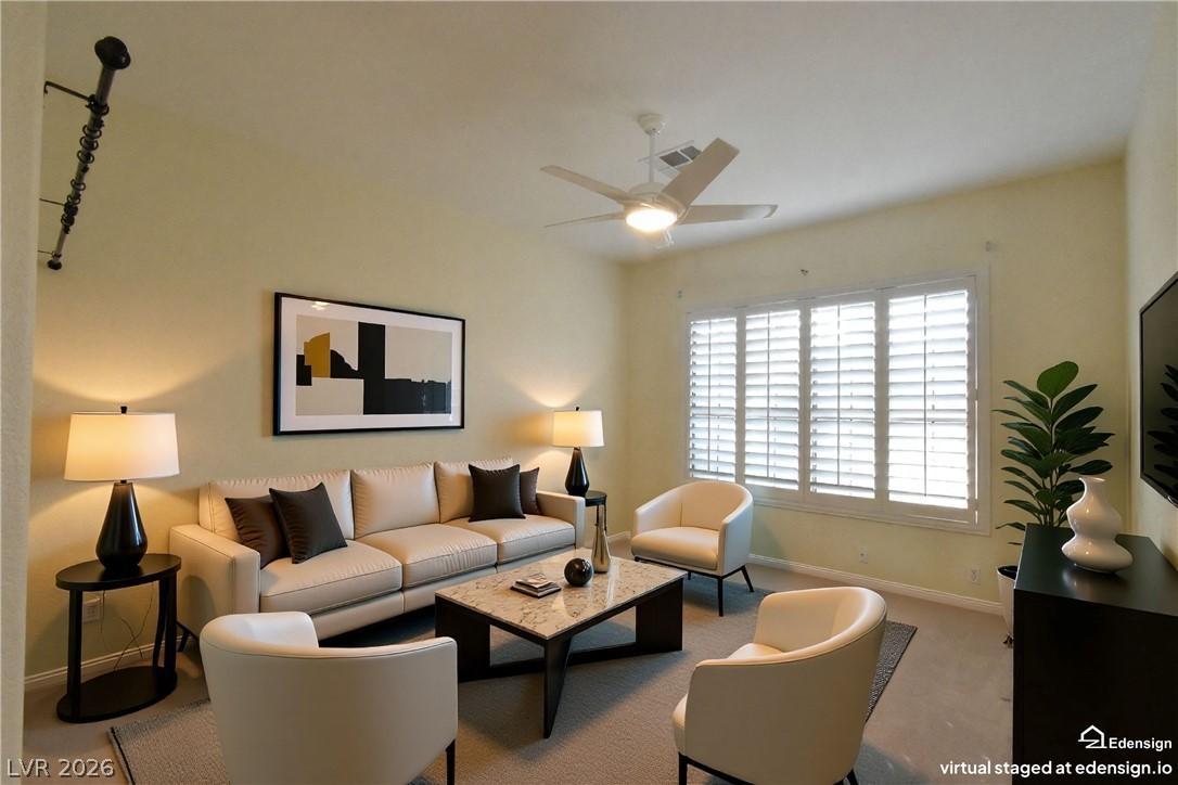 Image 3: Spacious living room offers comfortable carpet flo