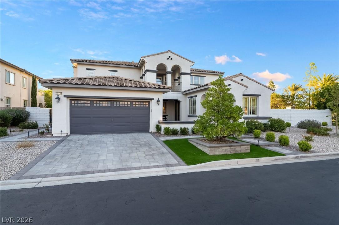 Image 4: A grand Mediterranean-style home awaits with an at
