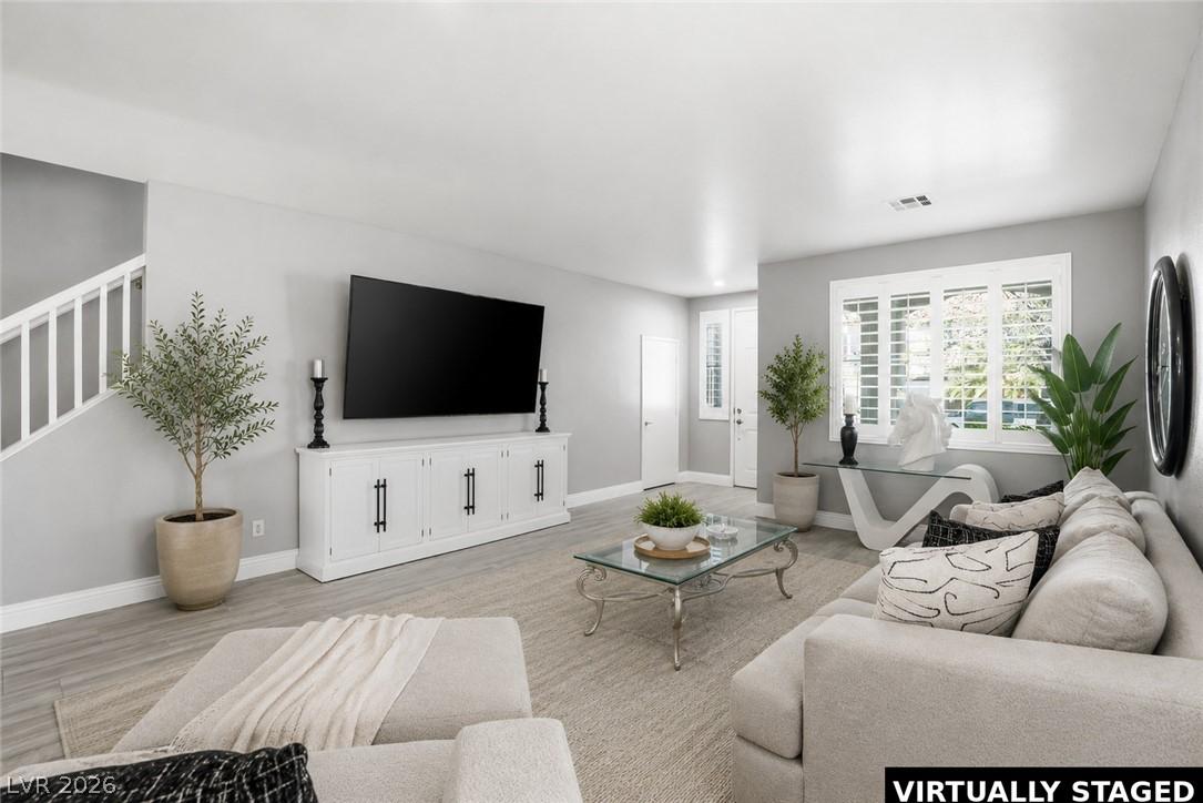 Image 4: Natural light illuminates this inviting living spa