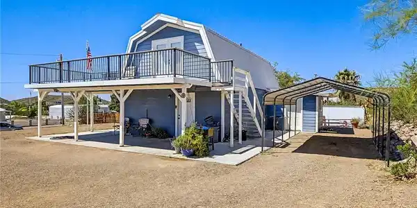 Image 3: A classic gambrel roofline defines this unique pro