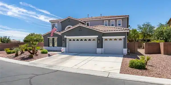 Image 2: An attractive multi-car garage fronted by a wide c