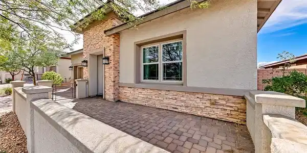 Image 2: Welcoming front courtyard space.
