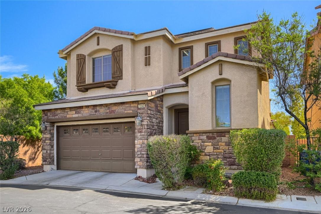 Image 3: This two-story residence presents a classic exteri