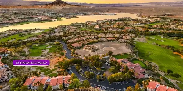 Image 4: Breathtaking views encompass a lake, golf course,