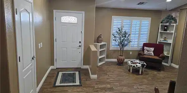 Image 2: Enter into a welcoming interior with durable floor