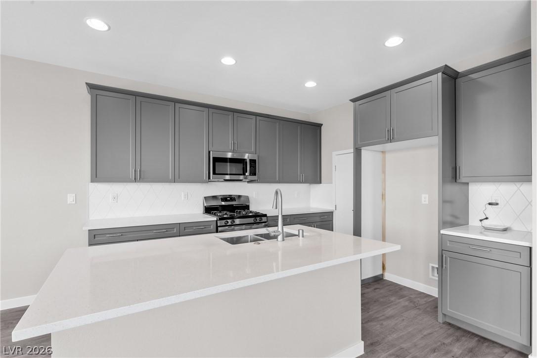 Image 1: Modern kitchen with sleek cabinetry, a spacious is