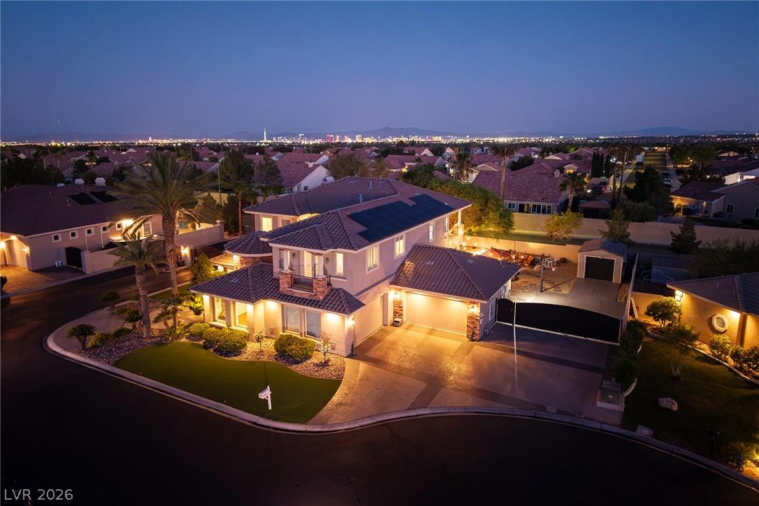 Image 1: An aerial evening perspective highlights the broad