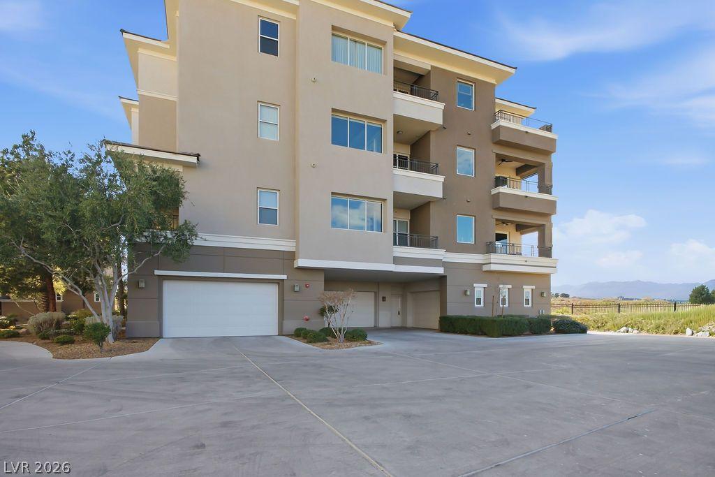 Image 2: Multi-story architecture featuring spacious balcon