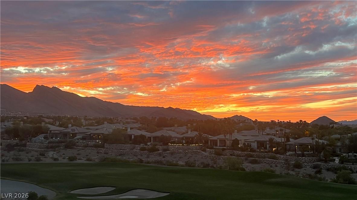 Image 4: Golden hour glows over a golf course, framing a co