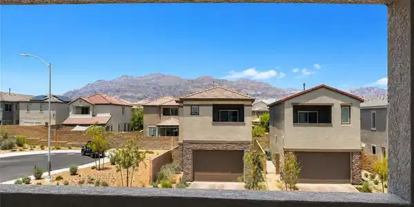 Image 2: Hillside home offer garage access and views of dis