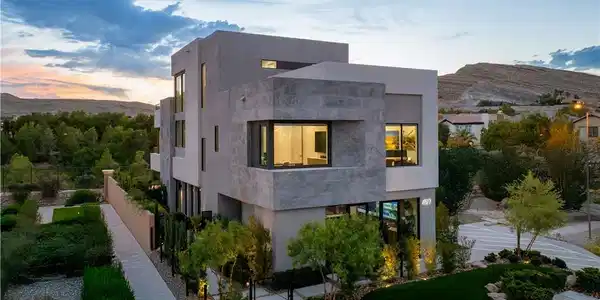 Image 2: A modern architectural marvel stands against a ser
