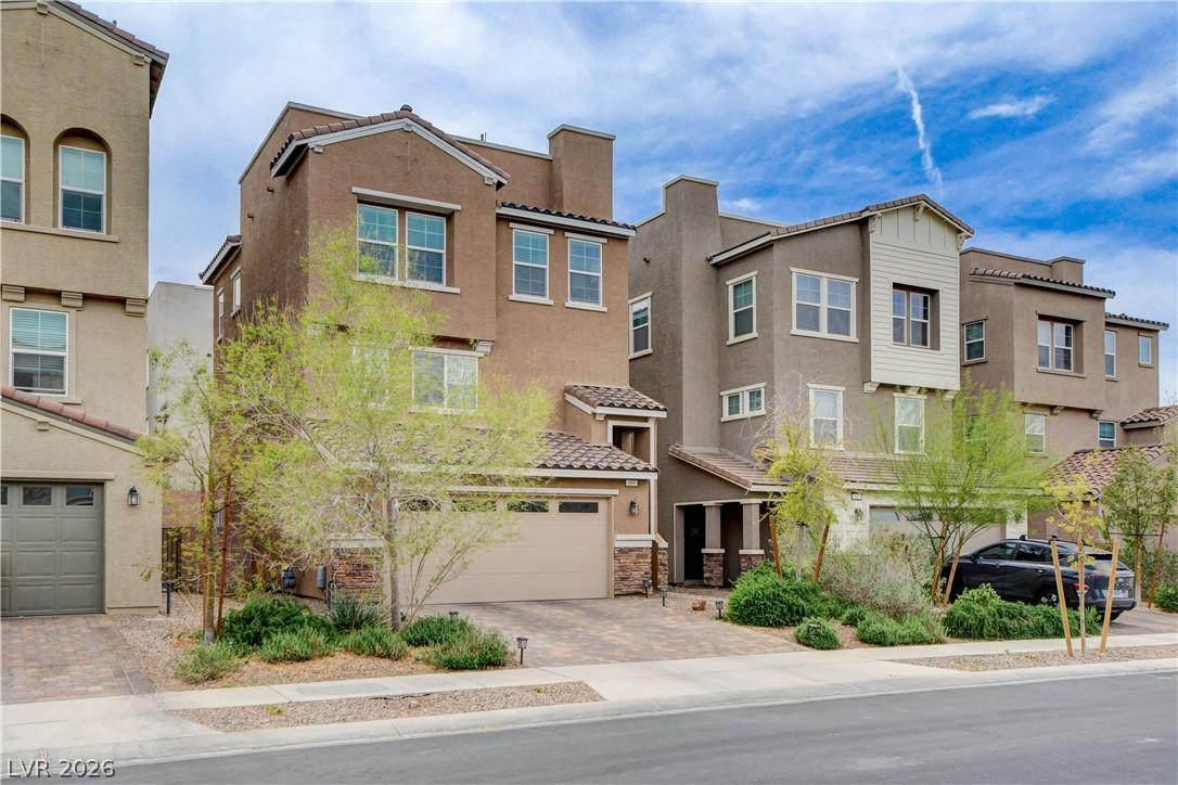 Image 4: A contemporary townhome with layered facades and a