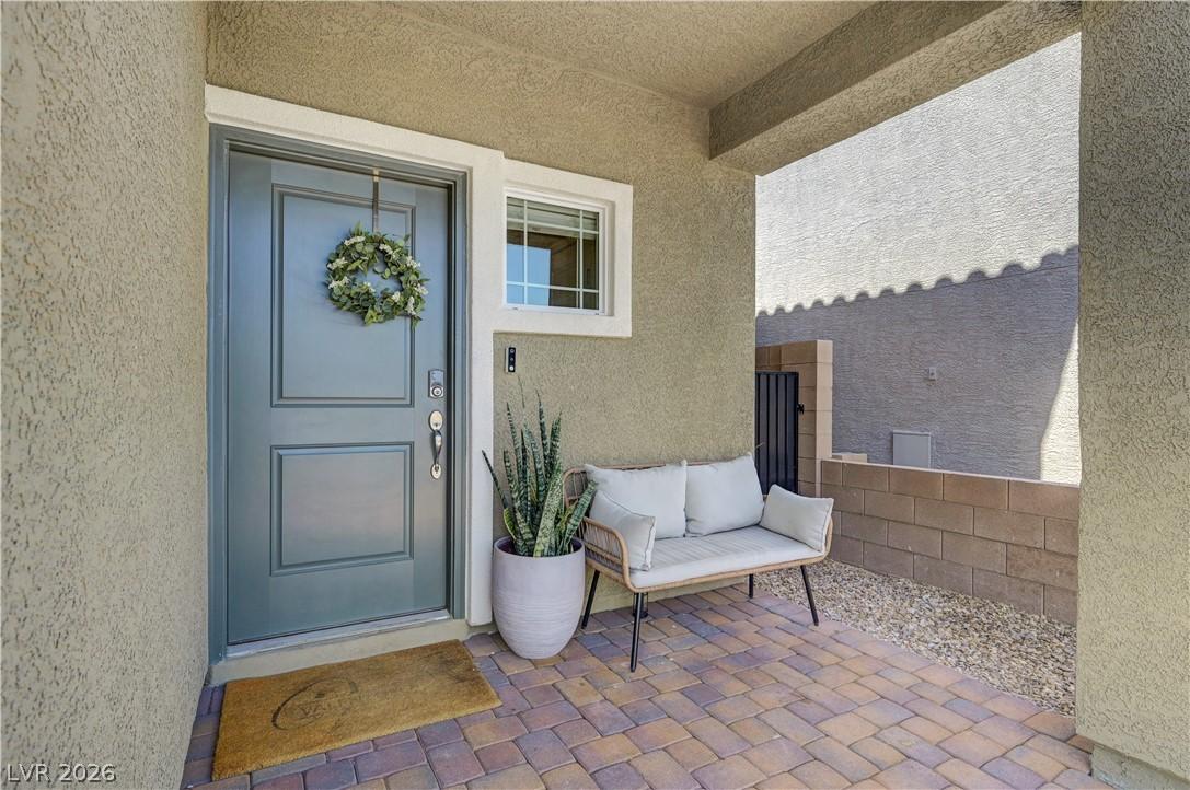 Image 2: A welcoming entry, with durable pavers and invitin