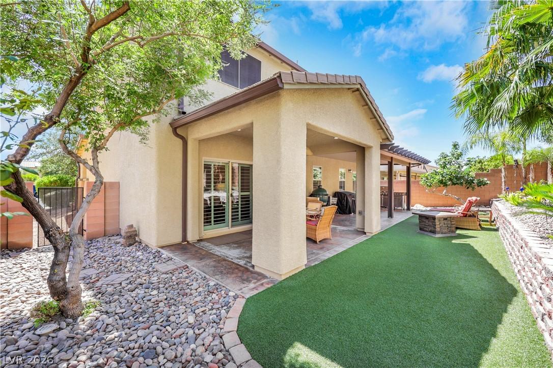 Image 2: This backyard is amazing! Full covered patio