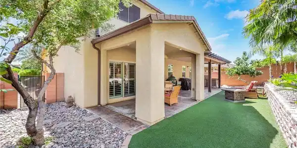 Image 2: This backyard is amazing! Full covered patio