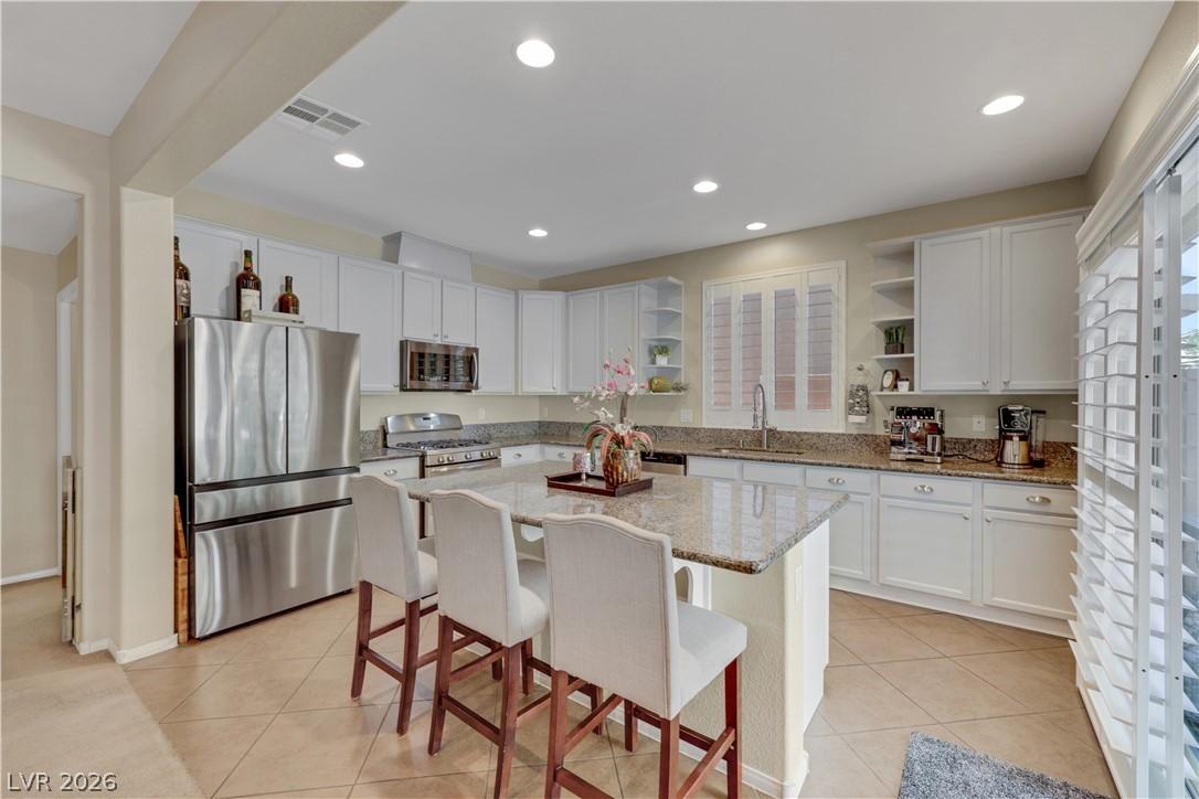 Image 3: Clean and modern island kitchen. Perfect for parti