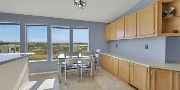 Image 4: A well-lit dining area offers a seamless transitio