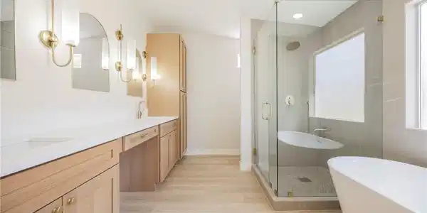 Image 3: Clean lines and warm wood cabinetry define this mo