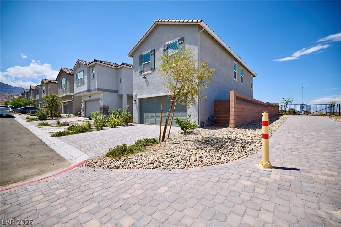 Image 3: Front of Home with Paver path adjacent and no neig
