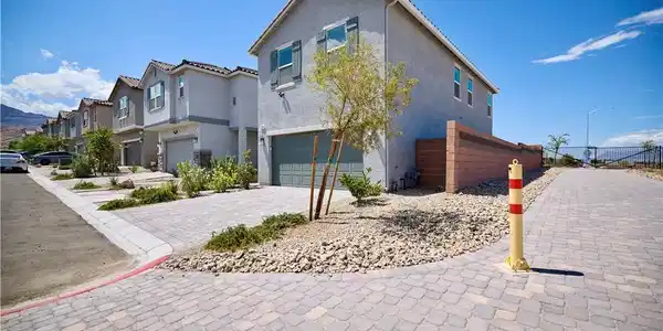 Image 3: Front of Home with Paver path adjacent and no neig