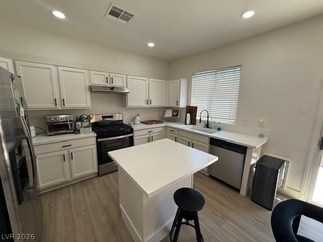 Image 2: A well-appointed kitchen features stainless steel