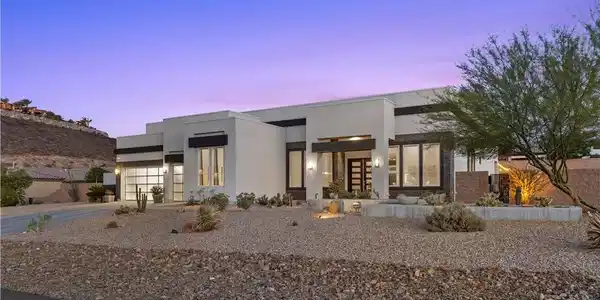 Image 3: This modern desert home features clean lines and a