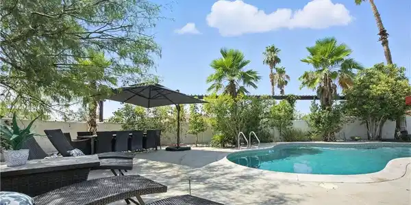 Image 3: Your private outdoor oasis awaits with a sparkling