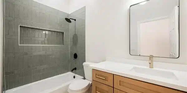 Image 4: Clean lines and vertical tiles define this modern