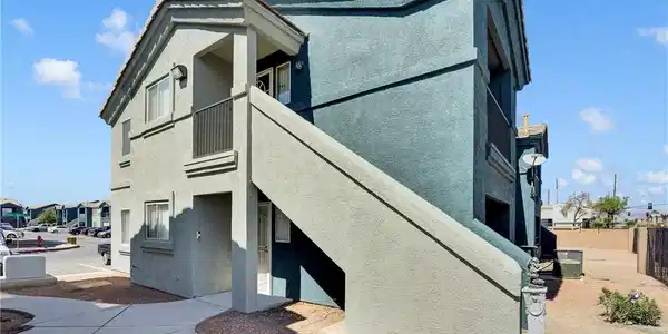 Image 3: An external staircase leads to private entryways i