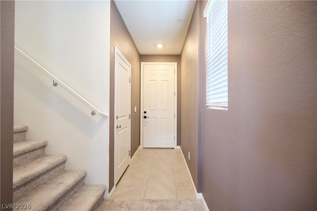 Image 4: Front Door entry and Interior Garage Door entry