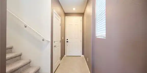 Image 4: Front Door entry and Interior Garage Door entry
