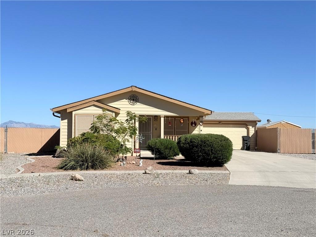 Image 2: A well-maintained single-story residence with a co