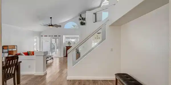 Image 4: Soaring vaulted ceilings and modern glass railings