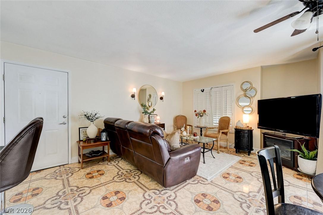 Image 4: Ornate tiled flooring complements this living area