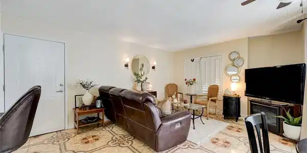 Image 4: Ornate tiled flooring complements this living area
