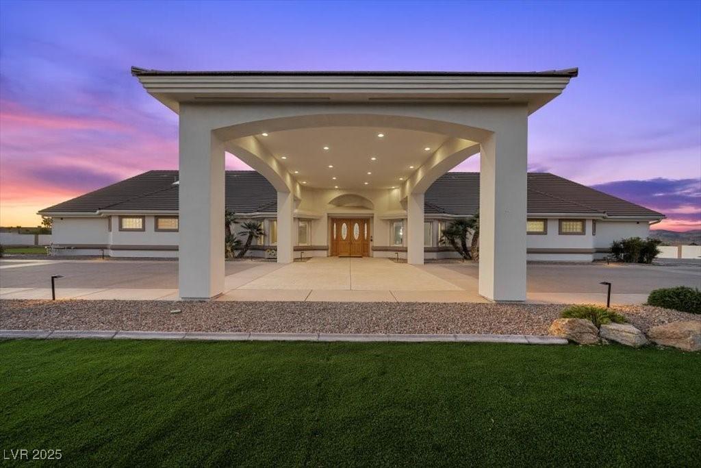 Image 2: View of main entrance with french doors
