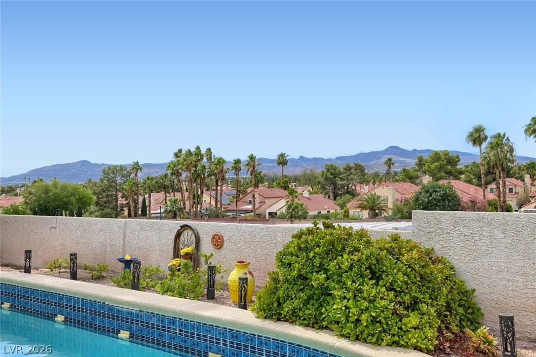 Image 3: Backyard with pool and beautiful unobstructed moun