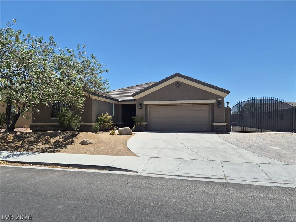 Image 2: An inviting exterior with a well-maintained drivew