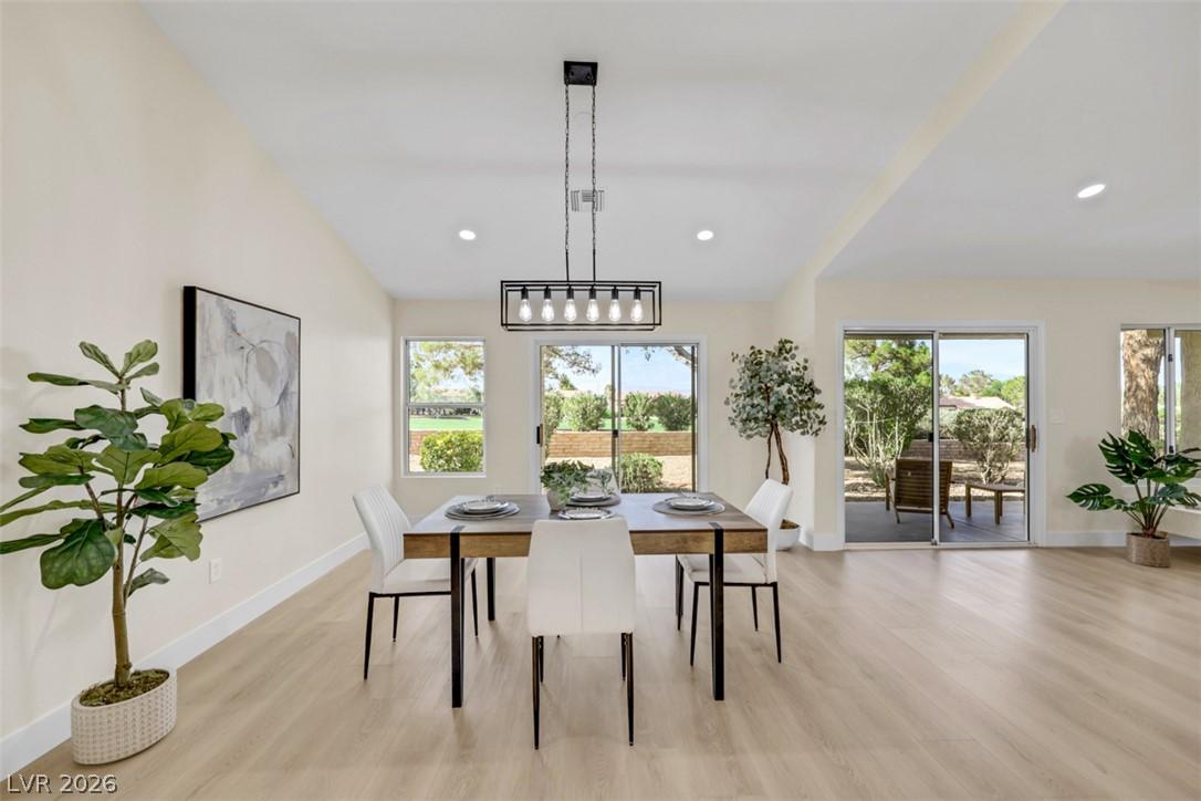 Image 3: A well-lit dining area offers direct access to the